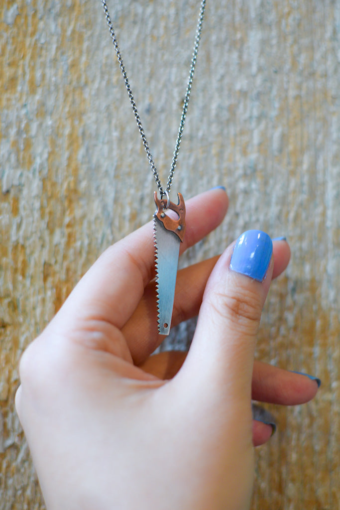 Saw Pendant